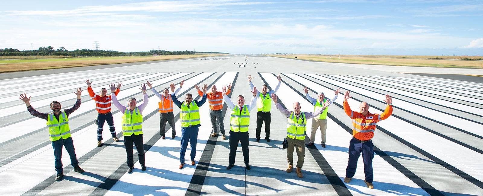 The new runway landed under budget at $1.1 billion