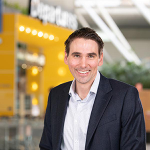 Man in suit smiling at camera